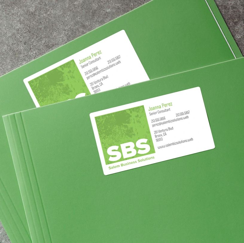 Business Card Stickers Business Card Stickers stuck to the front a green folder